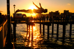 BROOKLYN, NY, USA - SEPTEMBER 1, 2025 - To mark the end of summer, lifeguards traditionally jump off the Steeplechase Pier in Coney Island.