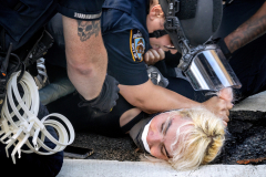 NEW YORK, N.Y., USA — June 10, 2025 — Members of the New York Police Department’s Strategic Response Group arrest protesters outside Federal Plaza during a planned demonstration against recent Immigration and Customs Enforcement arrests carried out by Department of Homeland Security and U.S. Border Patrol officers. The protest was part of a growing national resistance to President Trump’s aggressive and violent immigration enforcement policies.