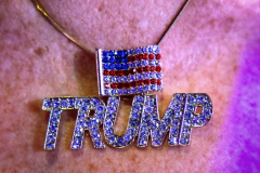 WASHINGTON, DC, January 20th, 2025:  A supporter of President Trump shows her devotion to him with a diamond necklace during the Liberty Ball during his Inauguration.