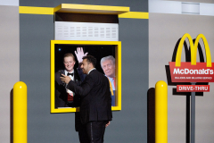 WASHINGTON, DC, January 20th, 2025: Jack McKone looks at a friend’s phone after he took photos of McKone posing with Trump at a McDonald’s drive-thru in an exhibit of the past year of Donald Trump’s life. There were also opportunities to take photos with Trump’s mugshot, with him at the Capitol on inauguration day, and with him behind his Presidential desk in the Oval Office.