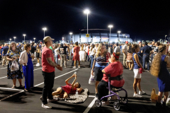 On September 10, 2025, right-wing political activist and Turning Point USA co-founder Charlie Kirk was killed by a gunman in Utah while attending a debate at Utah Valley University. Eleven days later, a public memorial was held at State Farm Stadium in Glendale, AZ, drawing nearly 100,000 attendees, including President Trump and various political and religious dignitaries. The event, which began as a spiritual service honoring the activist, shifted into a political rally focusing on Christian nationalist values. Hours before the stadium opened, Kirk supporters spent the night camping out in line. 

GLENDALE, AZ USA - SEPTEMBER 21, 2025 -  Early in the morning people wait to enter State Farm Stadium. The memorial wouldn’t start for another 6 hours.