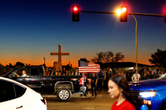 GLENDALE, AZ USA - SEPTEMBER 21, 2025 -  The sun starts to rise as people wait in their cars in line to enter the stadiun hours prior to the memorial.