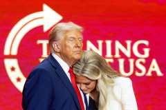 GLENDALE, AZ USA - SEPTEMBER 21, 2025 -  During the memorial President Trump consoles Erika Kirk, Charlie’s widow. The Charlie Kirk Memorial at State Farm Stadium.