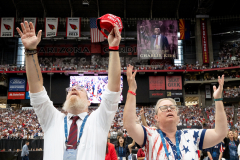 GLENDALE, AZ USA - SEPTEMBER 21, 2025 -  David Hubble and his wife Yvonne pray during the memorial. The Charlie Kirk Memorial at State Farm Stadium.