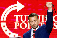 GLENDALE, AZ USA - SEPTEMBER 21, 2025 -  Conservative right actvist Jack Posobiec tells the crowd at Charlie Kirk’s memoirial to put on the ‘full armor of God’ and fight evil. The Charlie Kirk Memorial at State Farm Stadium.